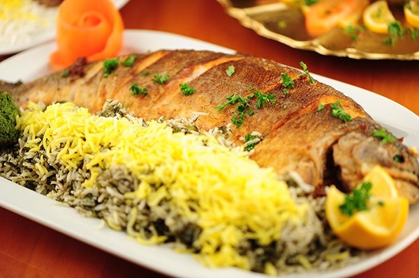 فلسفه خوردن سبزی پلو با ماهی شب عید چیست